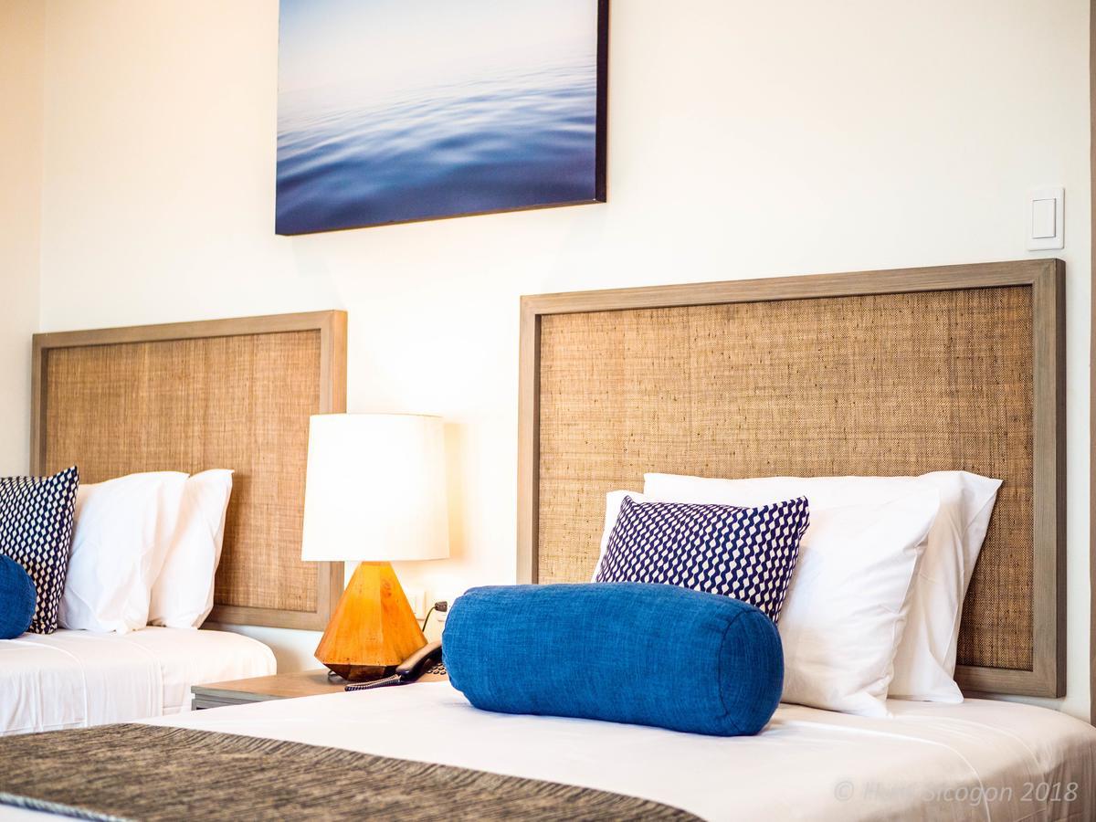 Huni Sicogon Hotell Carles Exteriör bild